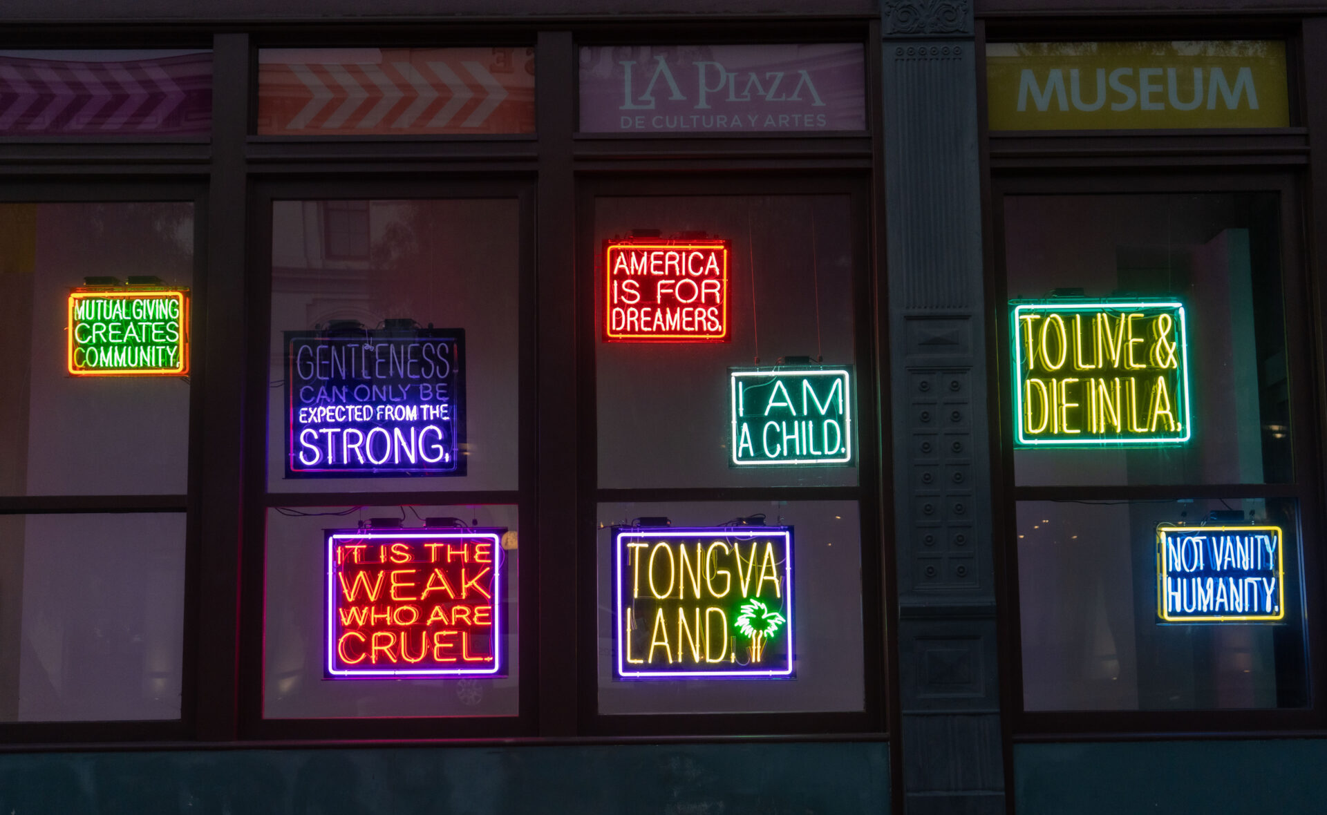 Patrick Martinez neon signs on windows